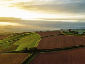 Colours of autumn Fields and Farms over Sheldon from a drone, Torbay, Devon, England, United