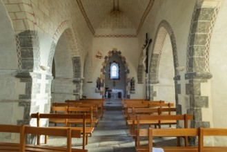 Painted church St Aignan's Church of Begues. Central nave flanked by two aisles. Allier department.