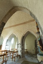 Painted church St Aignan's Church of Begues. Ogival arcades. Allier department. Auvergne Rhone