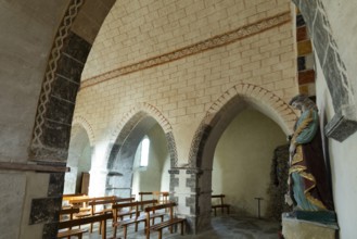 Painted church St Aignan's Church of Begues. Ogival arcades. Allier department. Auvergne Rhone