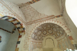 Wall paintings. Painted church St Aignan's Church of Begues. Allier department. Auvergne Rhone