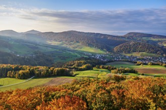View from the Gisliflue of an autumnal forest with the Jura foothills behind, Talheim, Canton,