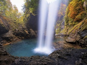 Waterfall mountain list in autumn-colored surroundings, Linthal, Klausenpass, Canton of Glarus,