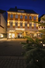 Municipal building with festive lighting at night, Nagold, Calw district, Black Forest, Germany