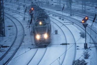 Winter weather, snowfall, VIAS regional express, regional traffic, on the route east, in front of