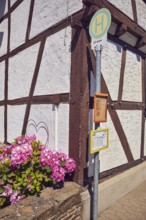Bus stop Insul Gasthaus Keuler, half-timbered house, facade, flower, sunny, Insul, Ahrweiler