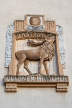 Relief of the Gasthaus Zum Goldenen Hirschen on a house façade, Fürth, Middle Franconia, Bavaria,