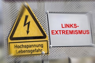 (photo montage) Sign with the words LEFT-WING EXTREMISM next to a warning sign for high voltage