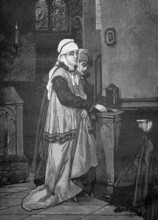 At the sacrificial stock, young couple makes a donation to the collection in the church, a praying