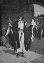 Jewish clothing dealer in the streets of Jerusalem, around 1850, man in oriental clothing with jug