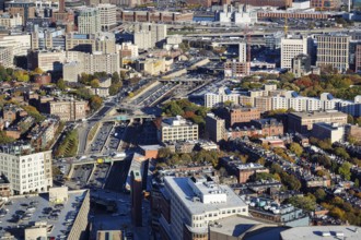 View from Prudential Tower of cityscape, city highway, historic brick buildings, modern