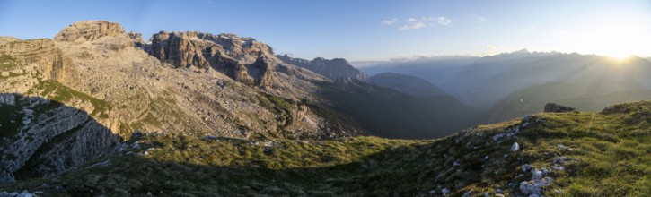 Panorama, view of rocky mountain peaks of the Brenta Mountains in the evening light, sunset over