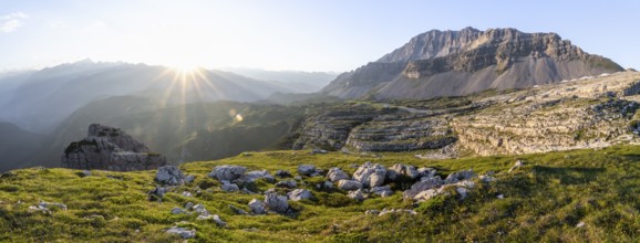 Sunset over the Adamello Group on the Grosté Plateau with Pietra Grande rock peak, Brenta