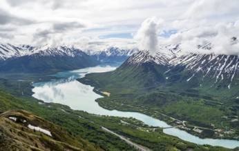 View of snowy mountains and turquoise lake Kenai Lake, Slaughter Ridge Trail, Cooper Landing, Kenai