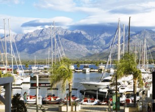 Calvi marina, with the mountains of the Balagne region in the Haute-Corse department, Corsica,