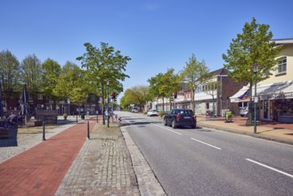 Residential and commercial buildings, general architecture, shops, retail, shopping, sidewalk,