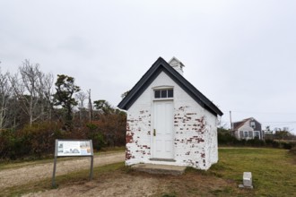 Historic kerosene house, Nauset Light, dusk in autumn, Cape Cod National Seashore in Eastham,