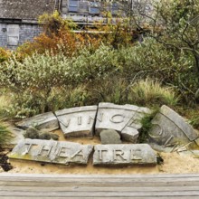 Ruins, former Provincetown theater, cinema, remains, sign with inscription, Whaler's Wharf,