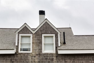 Facade detail, house with wooden shingles, typical architectural style, dormer window, Highland