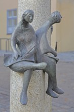 Sculpture Reading people artist unknown, two seated figures reading and writing in a book, book
