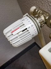Heating thermostat is below level 2 to reduce night time to save energy Germany