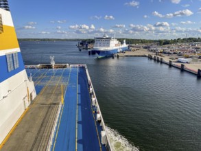 Large ferry is located in the port of Travemünde on, Scandinavia quay in the foreground dcas