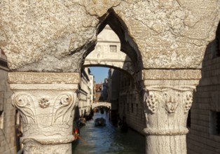 View of the Bridge of Sighs through the railing of the Ponte della Paglia, Venice, Veneto, Italy