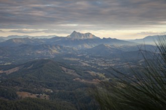 Sunset with an open view across the valley toward Mount Warning (Wollumbin), captured from the