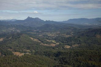 Clear blue sky with an open view across the valley toward Mount Warning (Wollumbin), captured from