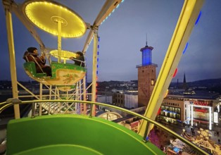 View of the town hall tower with the Christmas market from a Ferris wheel gondola, Hagen, Ruhr