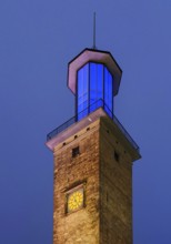 The illuminated and illuminated town hall tower in the evening, Hagen, Ruhr area, North