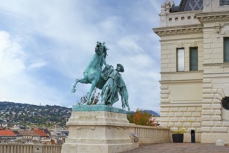 Buda Castle, Statue of the Horseherd taming a wild horse in front of the Riding Hall, Budapest,