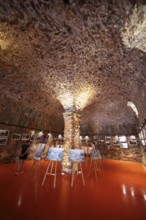 Exhibition at the Porto tourist office, a former Genoese weapons warehouse, interior view, Ota,