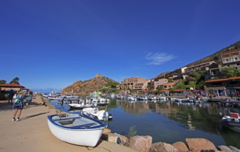 Boats in Port de Porto or Port of Porto on the Porto River, behind the Genoese Tower, Porto, Ota,