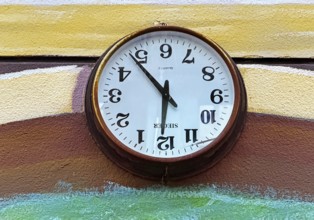 Kiefernstraße, residential street of the left-wing alternative scene with clock hung upside down,