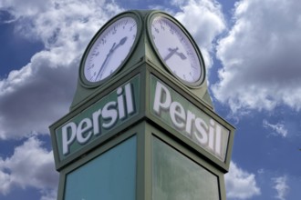 Detail of the persimmons clock, neon sign for the Henkel company, this historic persimmon clock was