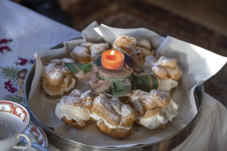 Cream puffs decorated on a tray, Franconia, Bavaria, Germany