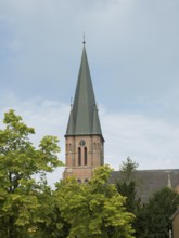 The mighty church spire, St. Anthony's Church, Papenburg, Emsland, Lower Saxony, Germany