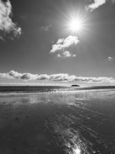 Lonely sandy beach, cumulus, sunbeams, monochrome, Singing Beach, Manchester-by-the-Sea, Cape Ann,