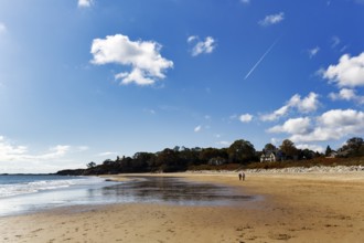Two walkers on sandy beach, Cumulus, Singing Beach, Manchester-by-the-Sea, Cape Ann, Massachusetts,