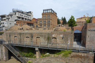Historic brick buildings with domes in urban surroundings, sulfur baths, Abanotubani spa district,