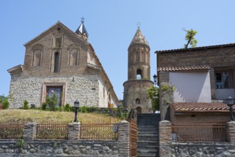 Historic church architecture with high tower under clear blue sky, St. George Church, St. George,