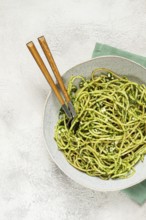Spaghetti with pesto sauce, homemade, no people