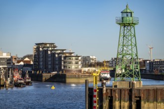Skyline of Bremerhaven, seen across the Weser, lighthouse at the mouth of the Geeste, harbour of