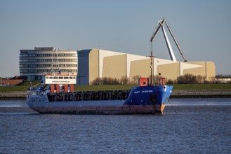 Danish cargo ship Ernst Hagedorn, anchored in the mouth of the Weser, in the background the