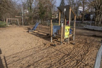 Various play equipment on an empty playground, Heroldsberg, Middle Franconia, Bavaria, Germany