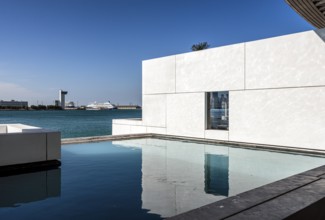 Interior design in Louvre Abu Dhabi, art museum by French architect Jean Nouvel, buildings on