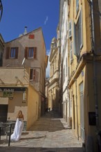 Old town alleyway, in the back the church of Saint Jean-Baptiste à Bastia or church of St. John the
