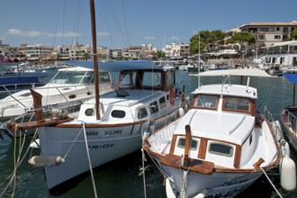 View of two small classic yacht yachts in the marina of Cala Ratjada, Mediterranean Sea, Cala