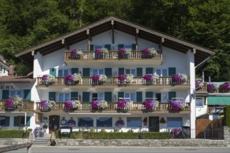 Apartment house with balcony and flowers, typical Bavarian house, town of Tegernsee, Upper Bavaria,